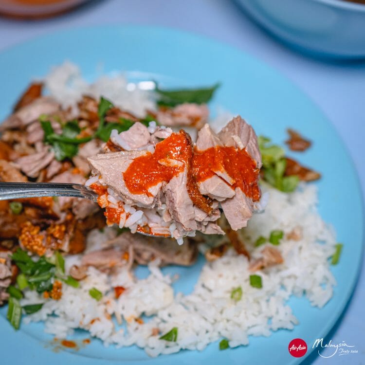 Kimberley Street duck kway chap, George Town, Pinang, Malaysia