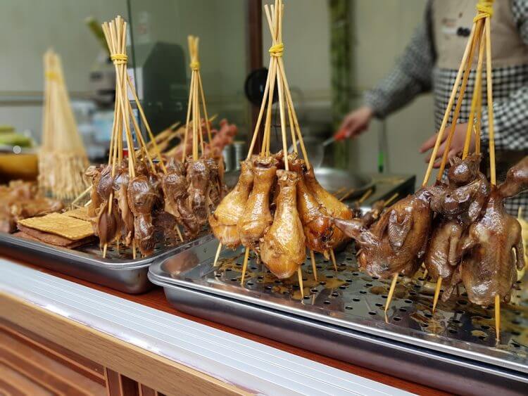 grilled chicken on stainless steel tray