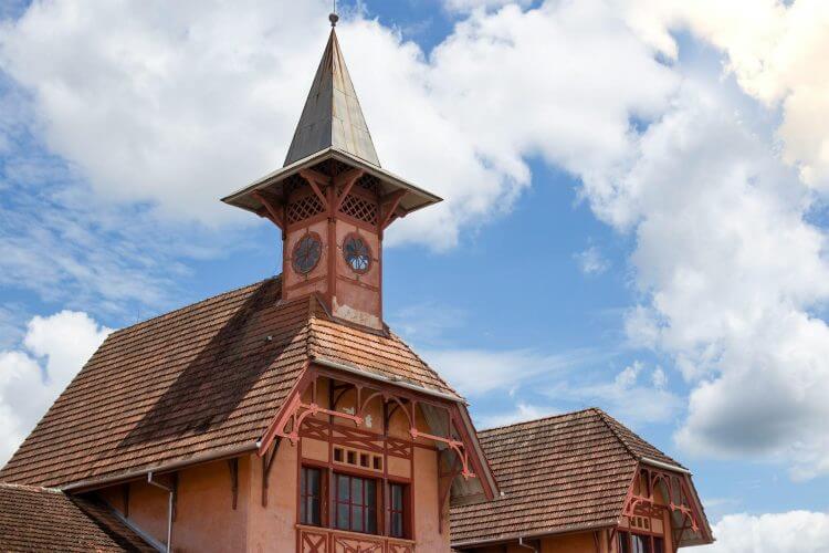 Exterior view of the historic railway museum with tower in Joinville, Brazil on a sunny day.
