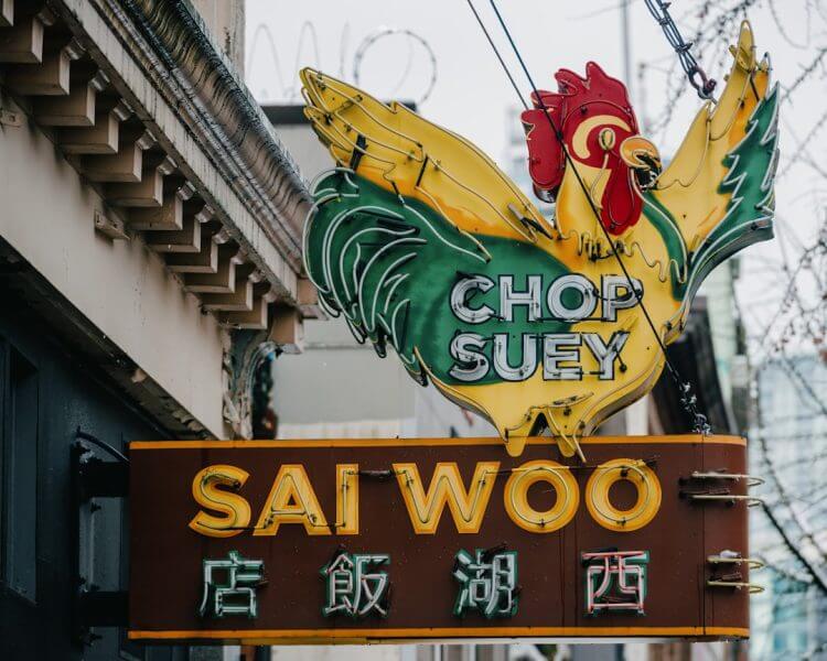 A sign for a restaurant with a rooster on it