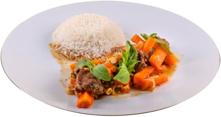 steamed rice and meat and vegetable slices