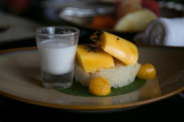 steamed rice with mango on top