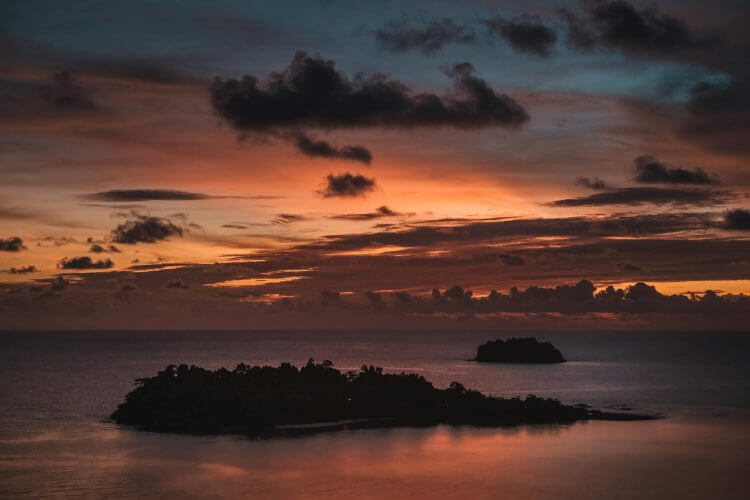Stunning twilight view of Koh Chang's serene islands with dramatic sky hues in Thailand.