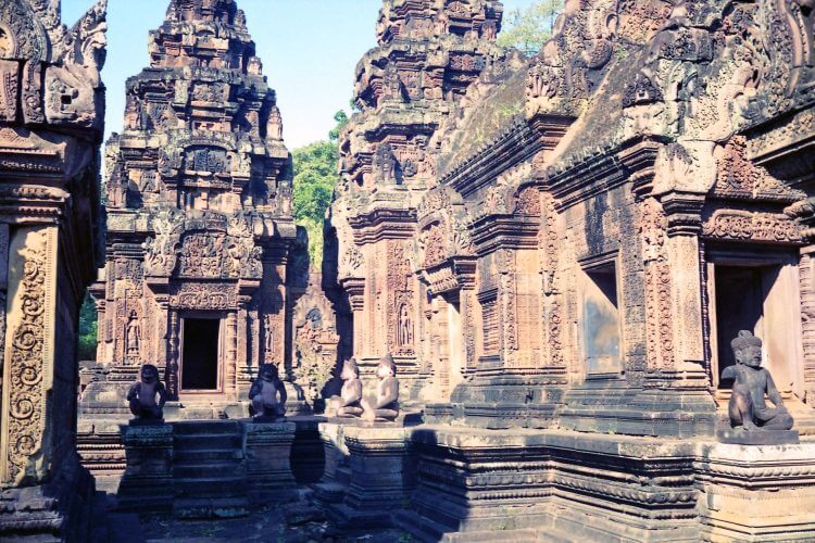Explore the detailed stone carvings of Banteay Srei Temple in Siem Reap, showcasing rich Khmer architecture.