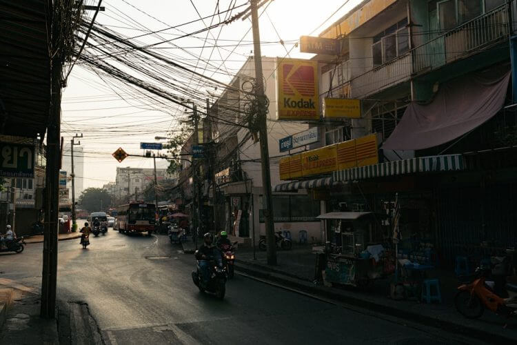 people riding motorcycle on road during daytime